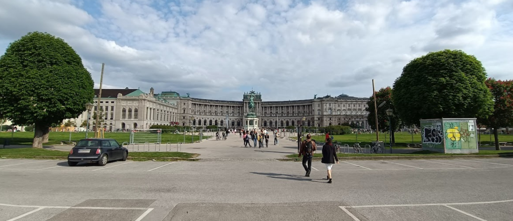 The view towards Hofburg from the entrance to Volksgarten.